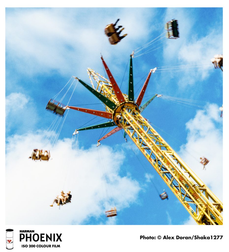 Image of a fairground ride. Shot by Alex Doran on harman phoenix 120 film